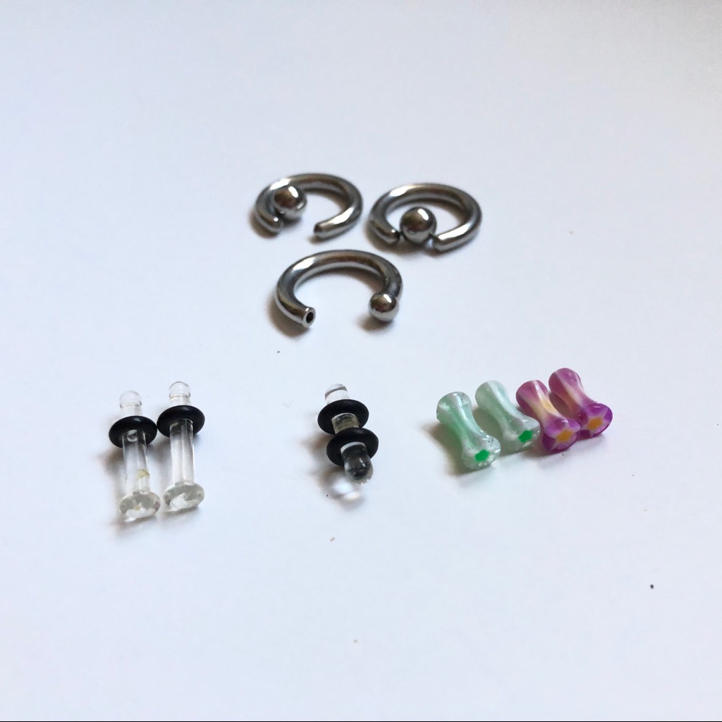 Lot Of 8 Gauge Plugs And Steele Body Jewelry